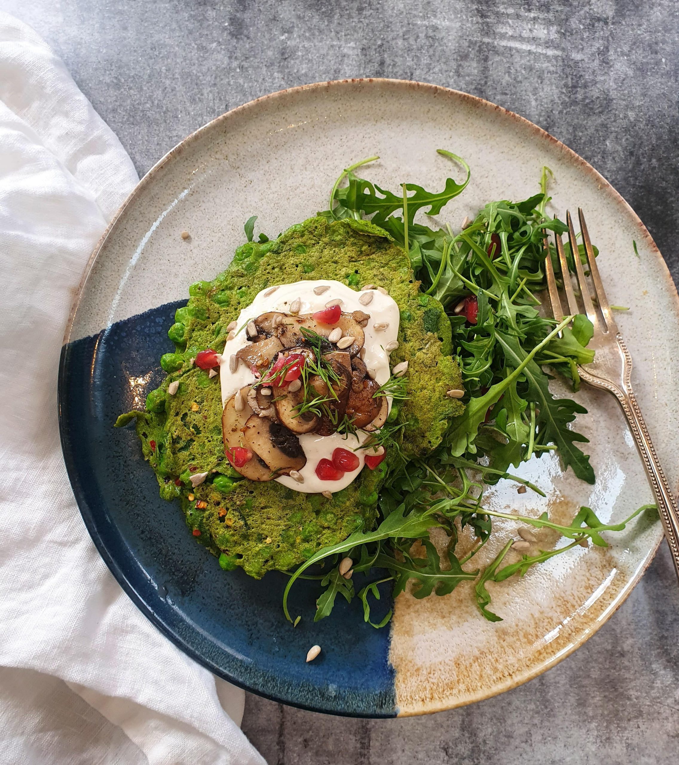 Herby pea, spinach & chilli fritters with tahini yoghurt and maple balsamic mushrooms