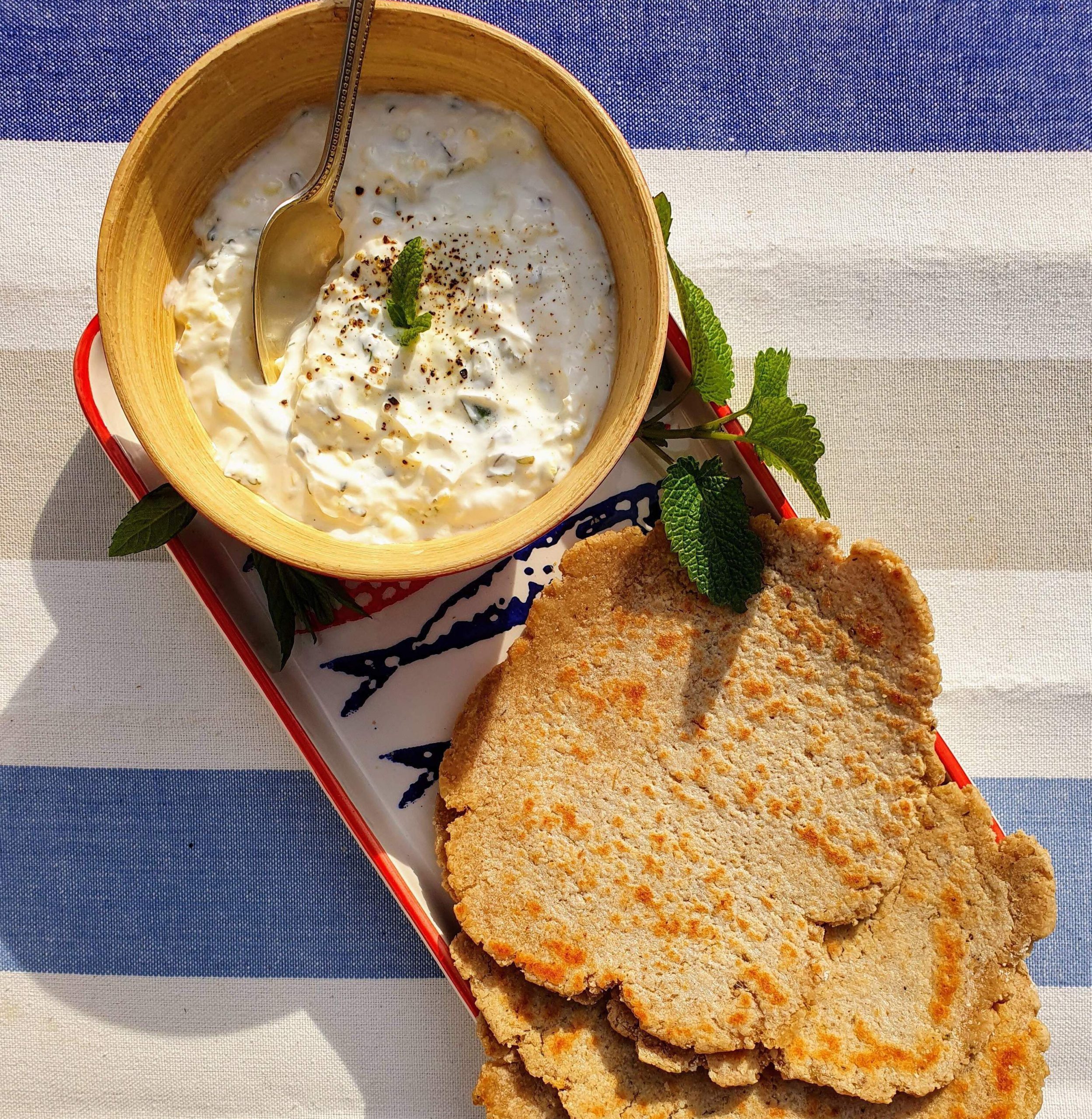 Fresh mint and cucumber tzatziki with homemade flatbreads