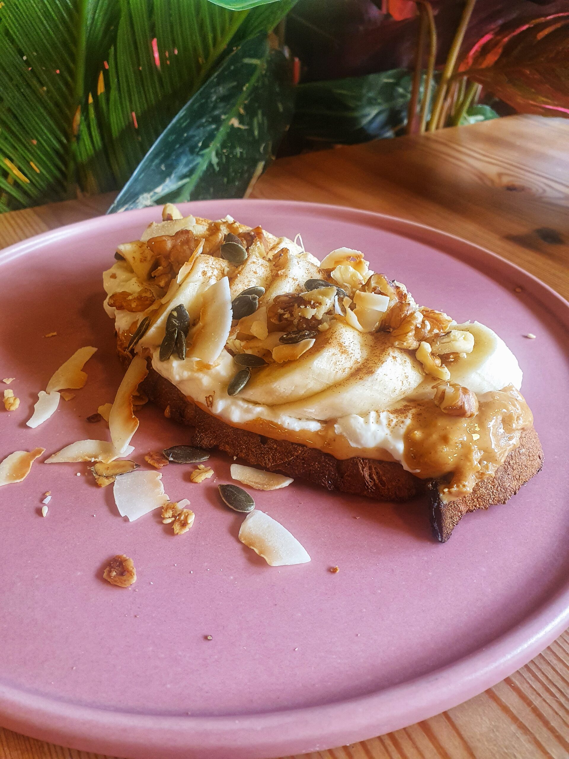 Loaded sourdough toast with nut butter, yoghurt, sliced banana