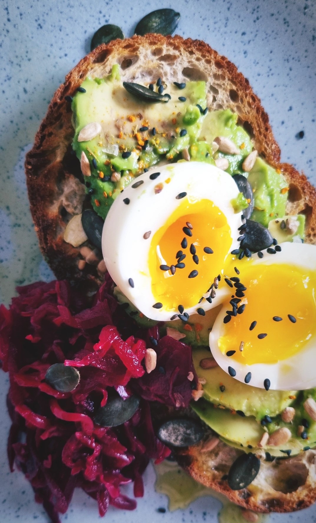 Simple Avocado & Eggs on Sourdough Toast with Nigella Seeds & Purple Sauerkraut