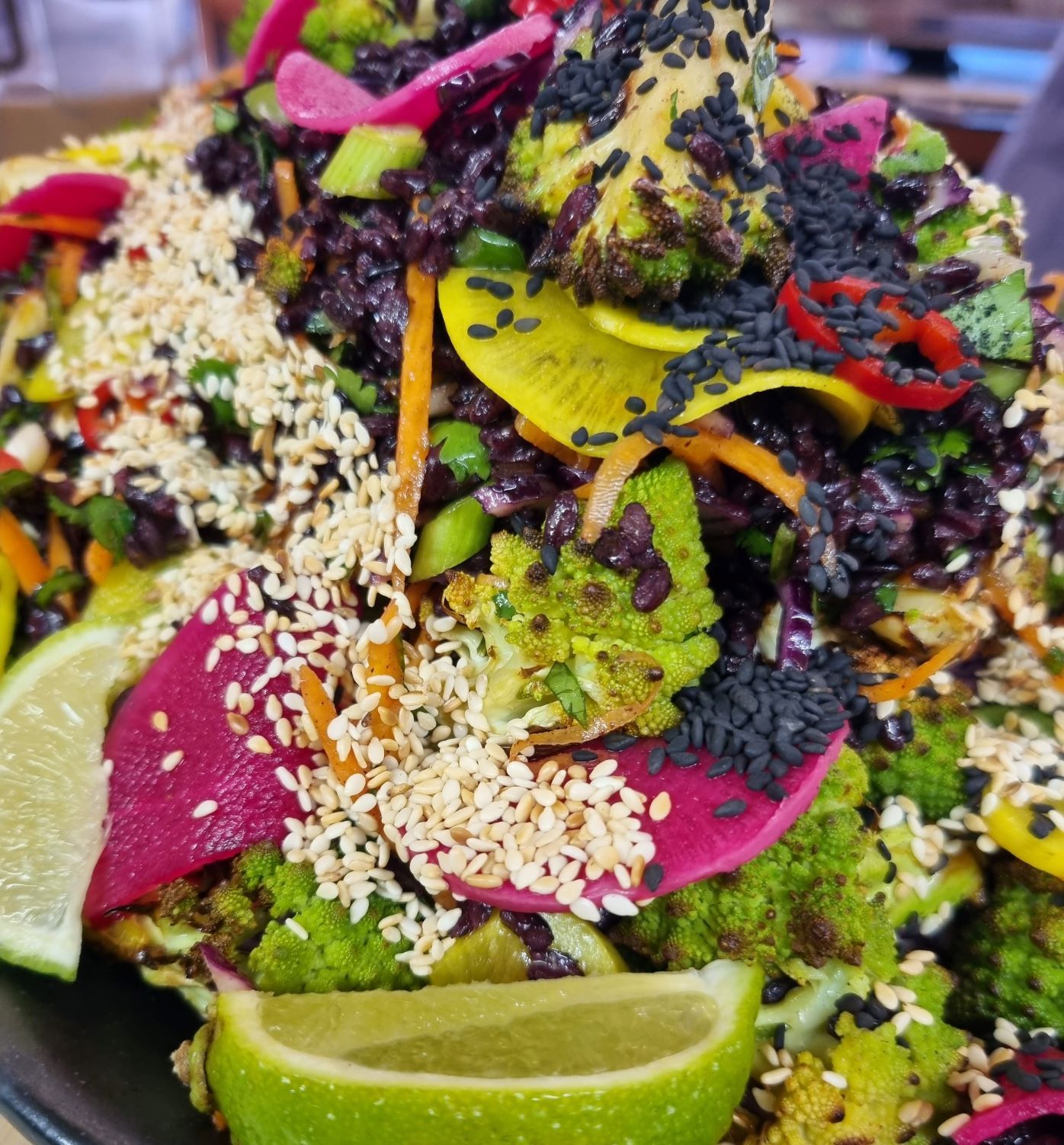 Grilled Romanesco Cauliflower with Prawns, Black Rice, Red Cabbage, & a Miso Dressing