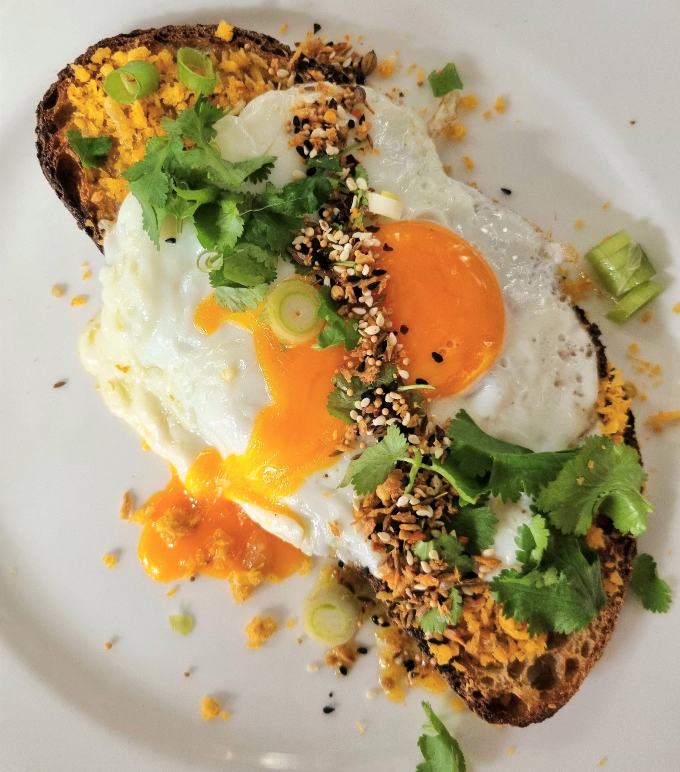 Toasted Sourdough With Coconut & Chilli Sambol, Fried Egg & Coriander